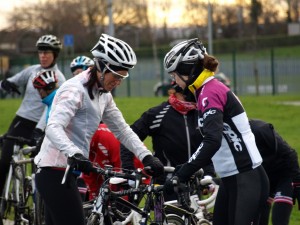 Heather Bamforth talks through bike set up with riders.